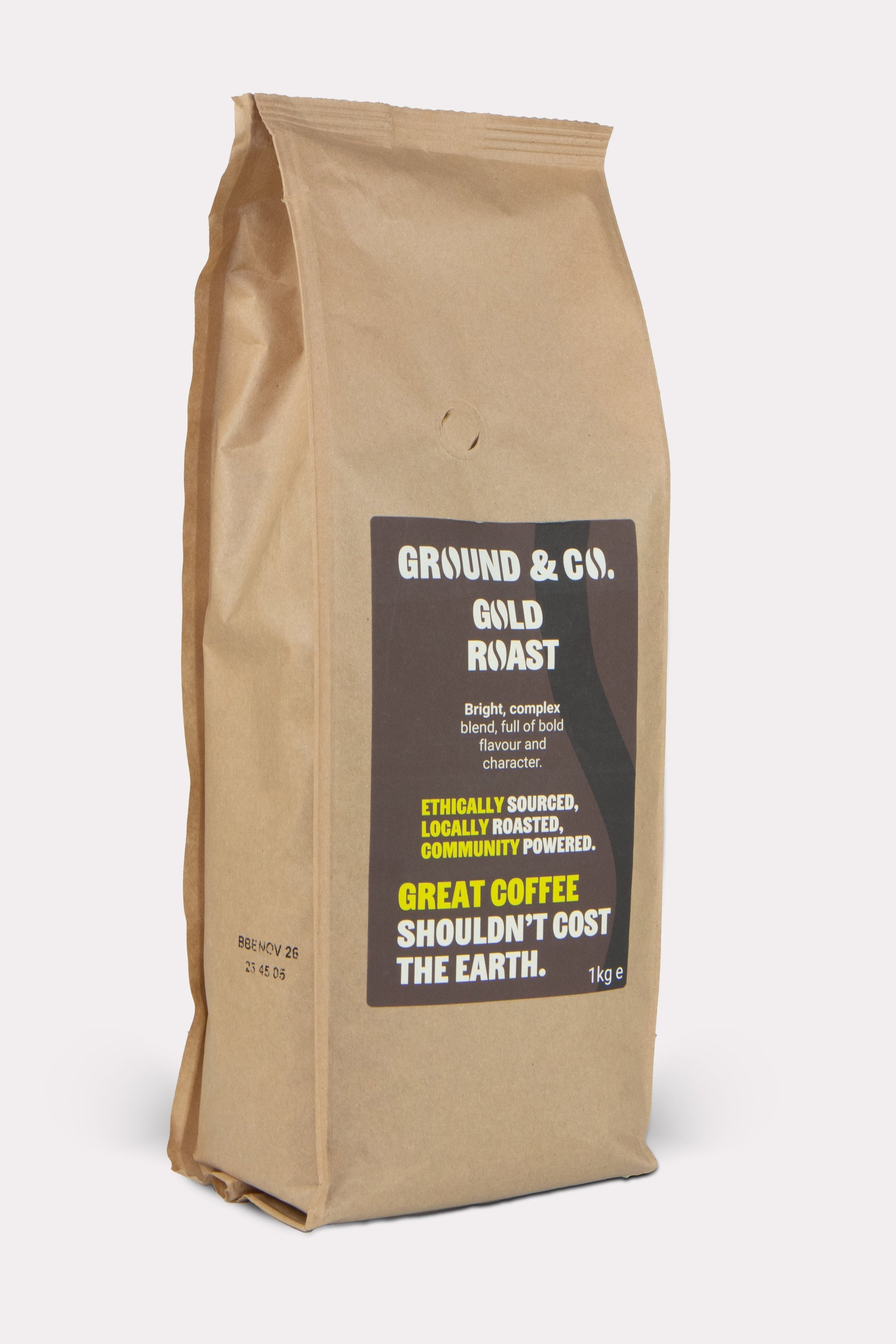 A bag of Ground and Co. gold roast coffee in a white background