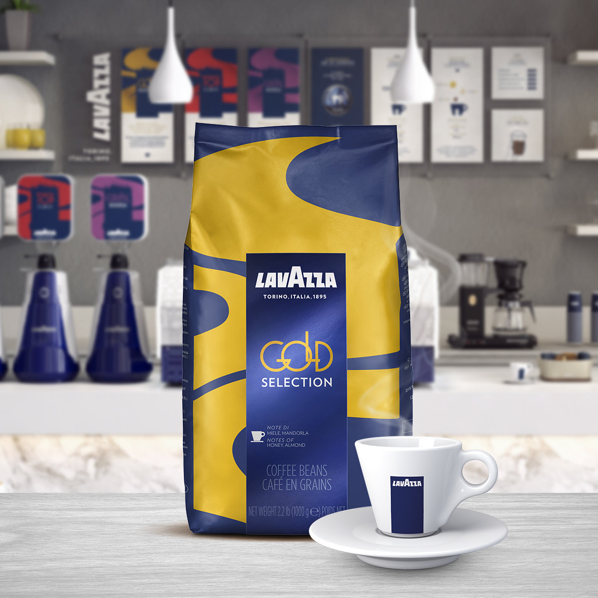 Lavazza gold selection coffee beans bag sitting behind a Lavazza coffee cup