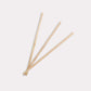 Three wooden sticks on a white background