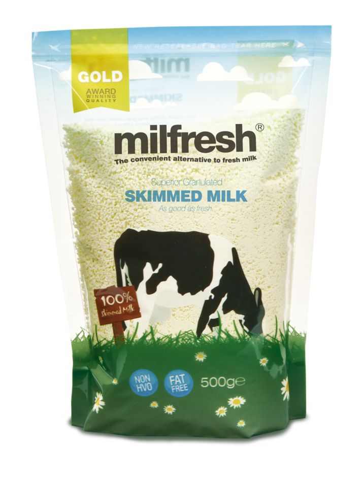 Package of Milfresh gold skimmed milk with a cow illustration on a white background