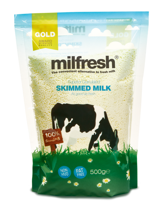 Package of Milfresh gold skimmed milk with a cow illustration on a white background